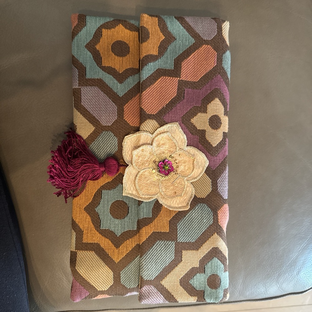 Geometric Patterned Clutch with Floral Accent